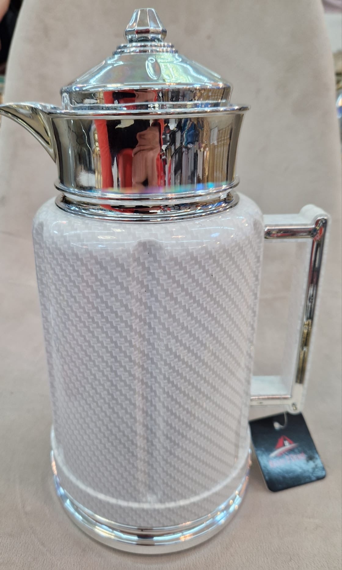 Thermos blanc et argenté