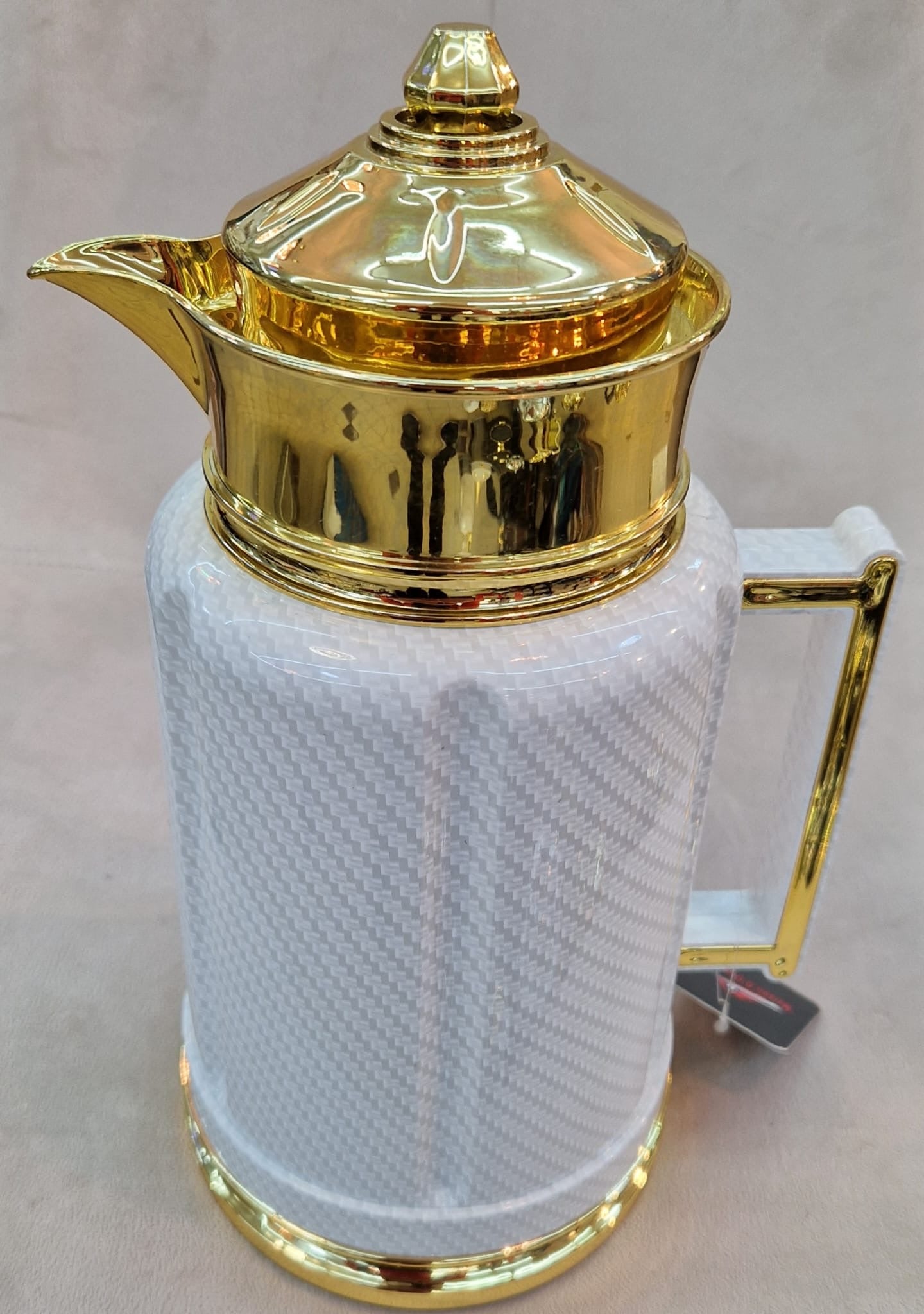 Thermos blanc doré