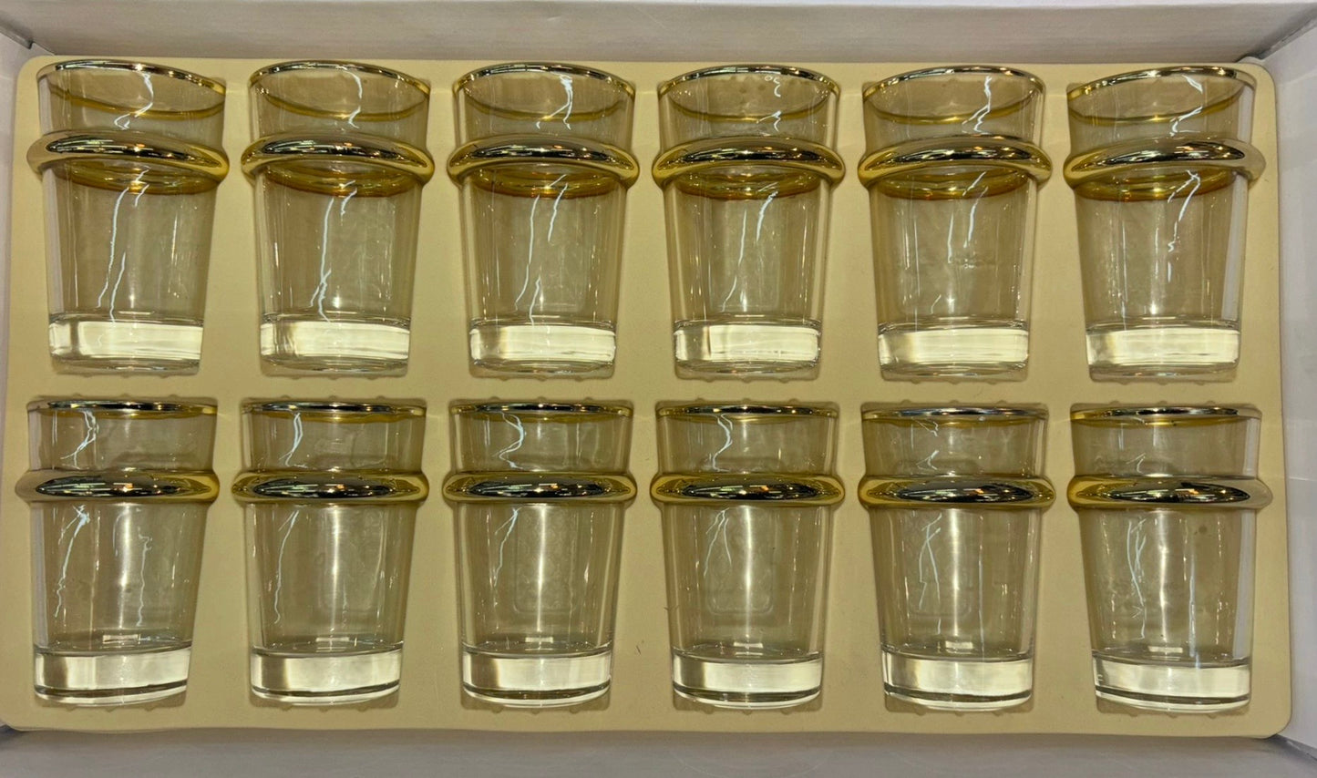 Verre à thé anneaux doré