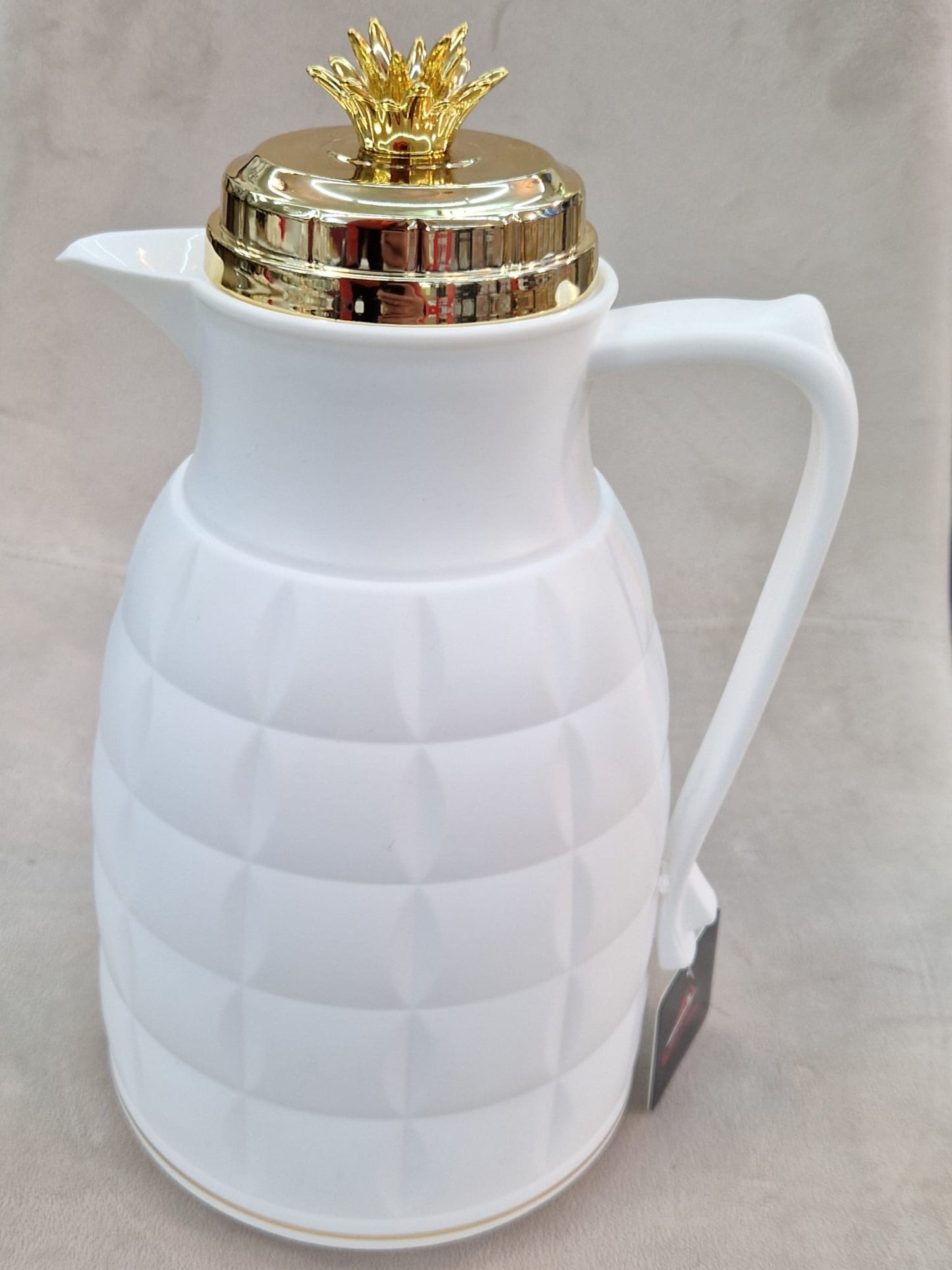 Thermos blanc et doré