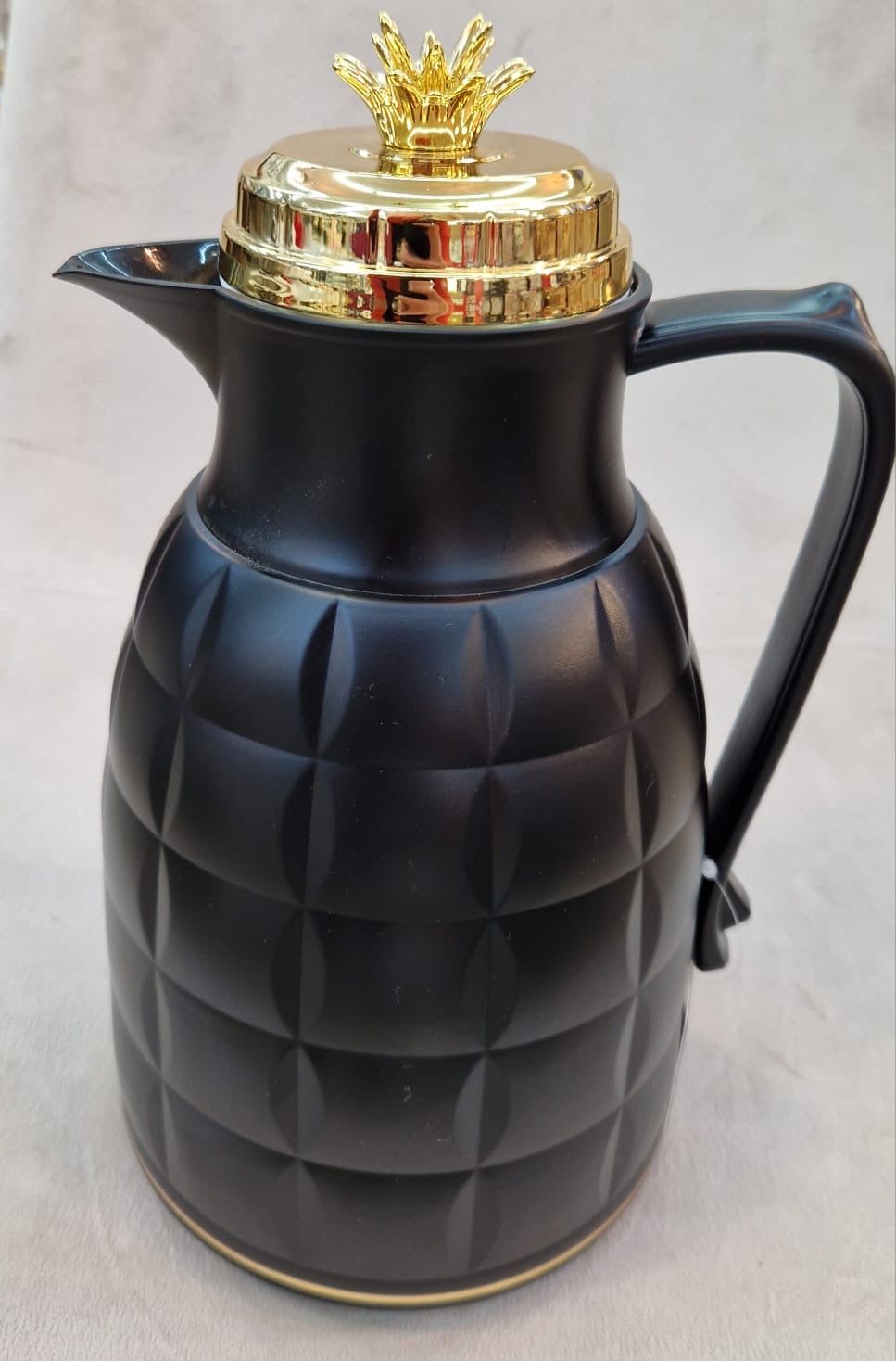 Thermos noir et doré